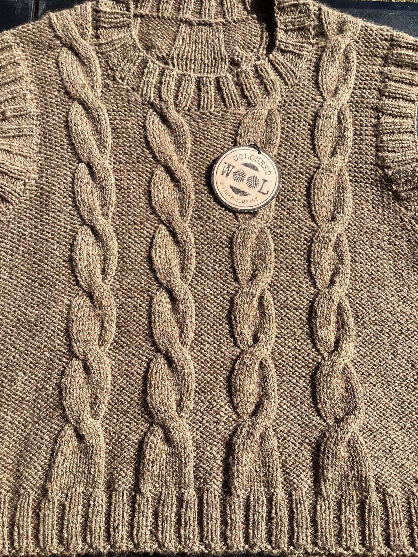 Handknitted Vest from our Corriedale and Suri alpaca blend.